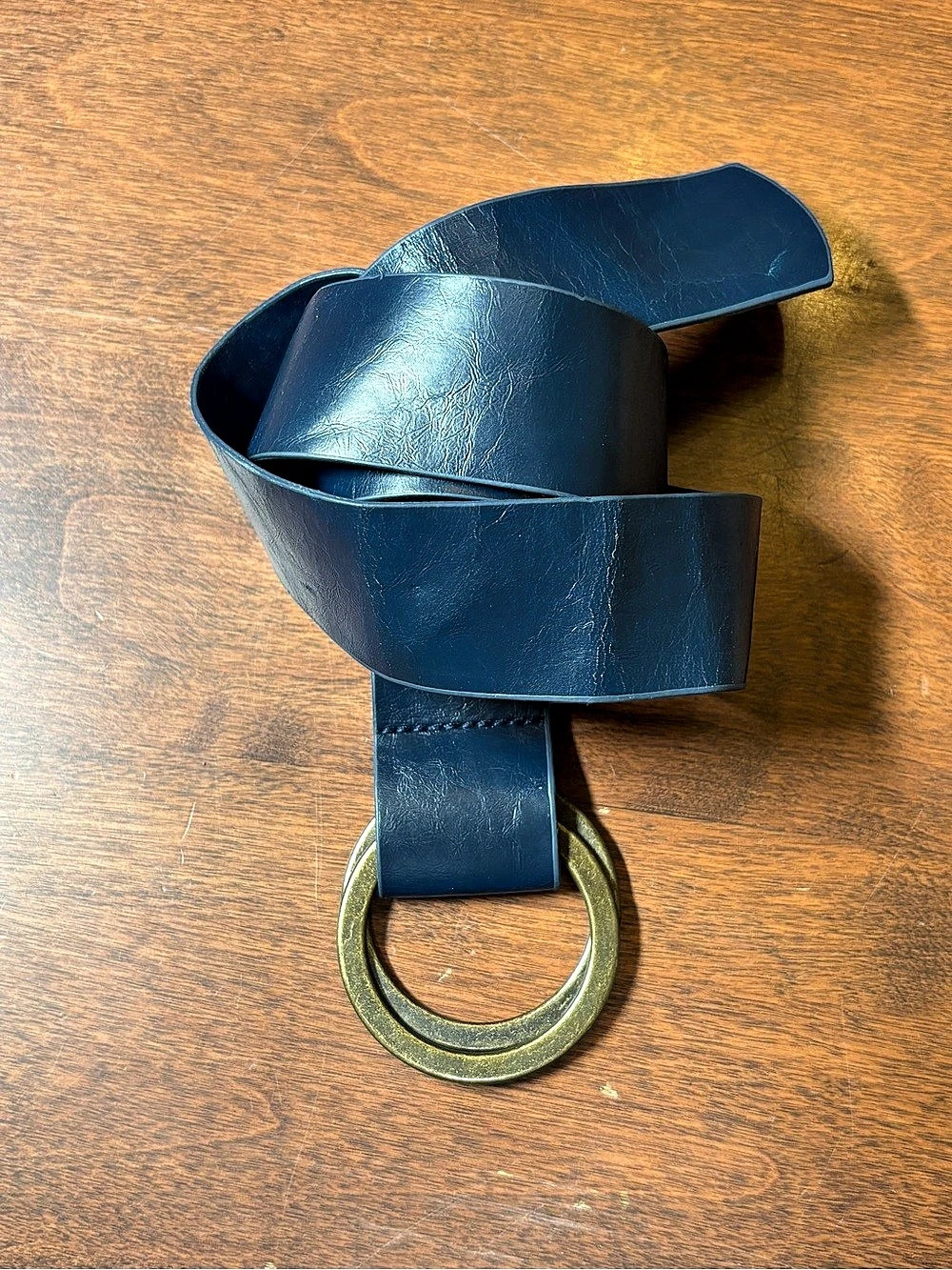 Super cute retro-style navy blue faux leather belt featuring a chunky antique br